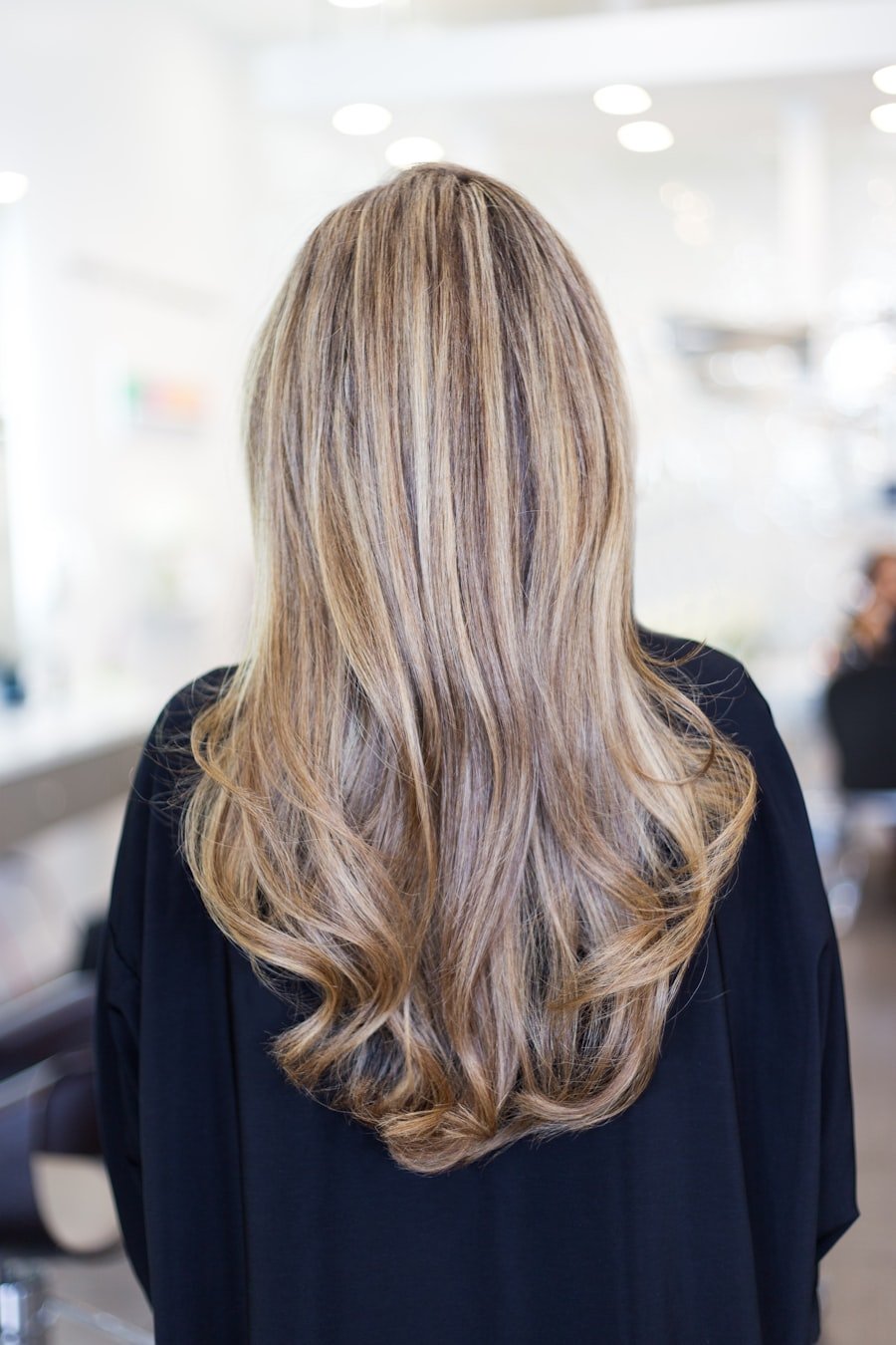 Foil highlights being applied to hair